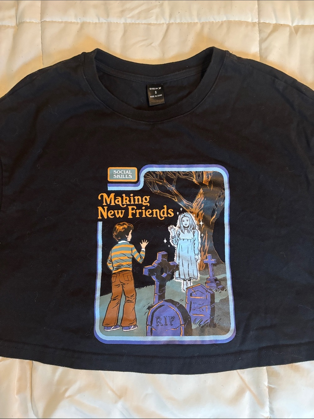 SHEIN Black Crop Top with Multicolor 'Making New Friends' Graphic